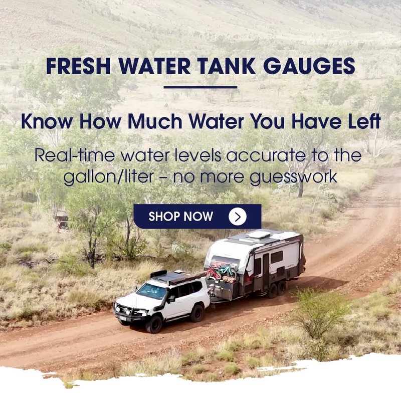 Promotional outdoor graphic showing a white SUV towing a small travel trailer on a dirt road, with large text reading 'FRESH WATER TANK GAUGES' and a 'SHOP NOW' button. The product being promoted appears to be water tank gauges rather than the trailer or vehicle itself.